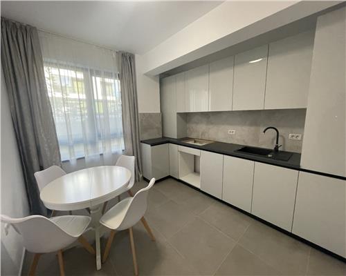 Apartament nou , mobilat si utilat cu gradina pe acte!